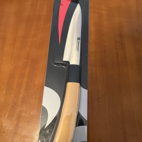 Kitchen knife new with beige handle