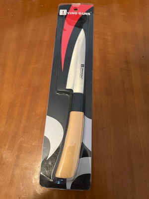 Kitchen knife new with beige handle