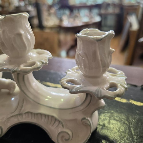 Hutschenreuther Selb porcelain four-light candelabra used, putti design