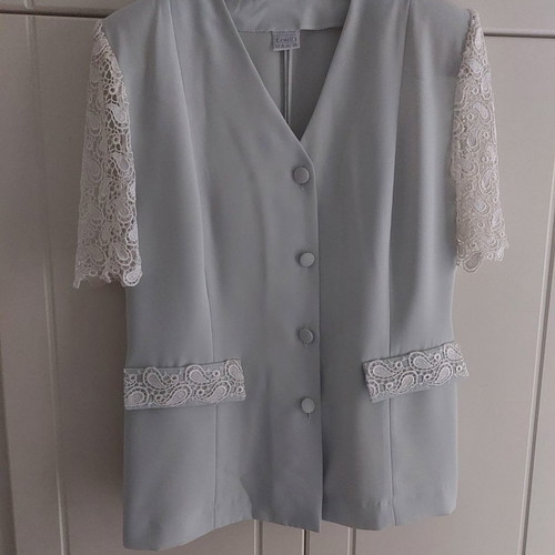 Women's jacket with lace sleeves used, size 50