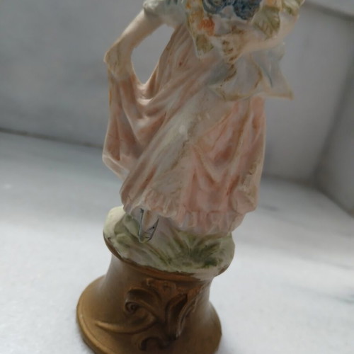 Vintage decorative figurine small lady with atmospheric details