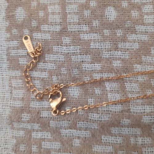 Short necklace with eye and infinity symbol new, gold color