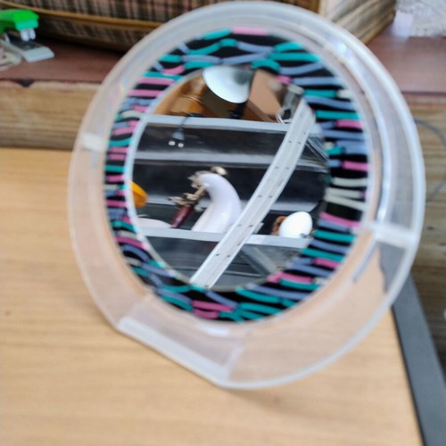 Makeup tabletop mirror with two sides used