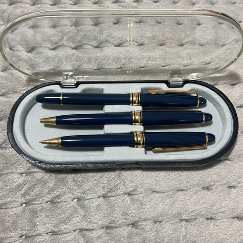 Writing set unused with pen, fountain pen and mechanical pencil in blue case