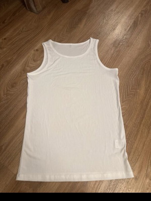 White sleeveless top, size L