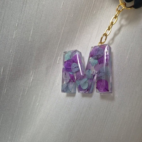 Handmade monogram keychain from resin custom made with purple and turquoise flowers