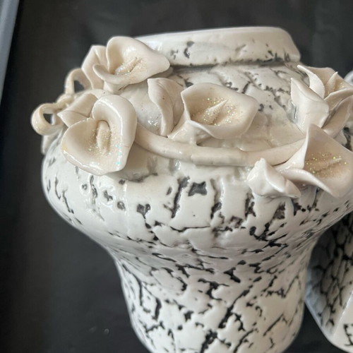 Ceramic vase new with embossed flower and curved detailed design