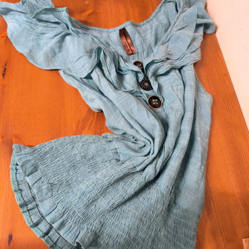 Blouse sleeveless turquoise size S used with decorative buttons