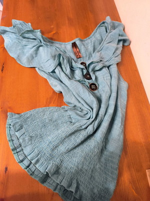 Blouse sleeveless turquoise size S used with decorative buttons