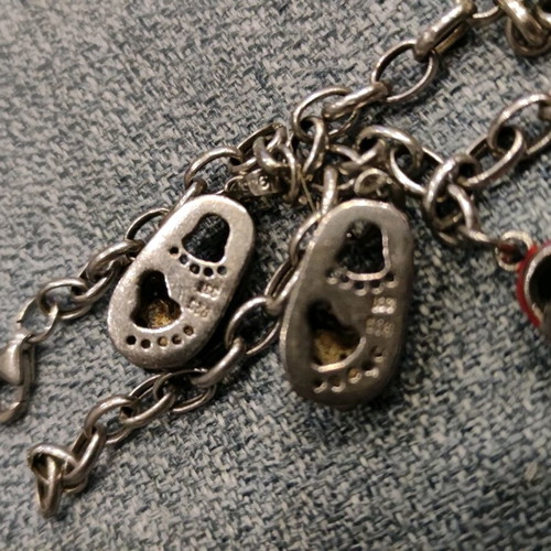 Silver 925 chain with 4 baby shoes used