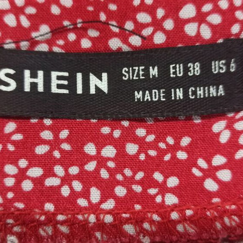 Shein wrap skirt like new, short red with small white flowers
