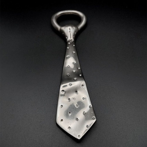 Set of 4 items like new (wine cork, tie opener, bell, pouch)