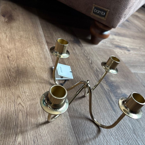 H&M Home gold metal four-arm candlestick