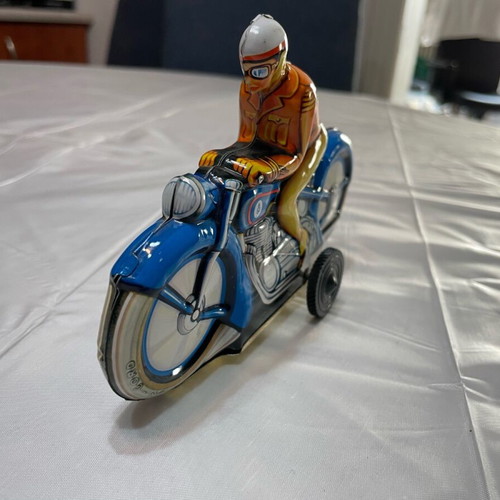 Motorcyclist vintage tin toy made in West Germany like new
