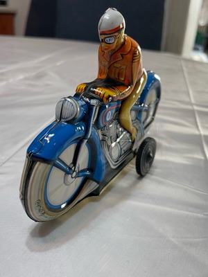 Motorcyclist vintage tin toy made in West Germany like new