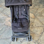 Maxi Cosi travel stroller used with accessories