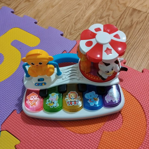 Baby piano like new with sounds and carousel