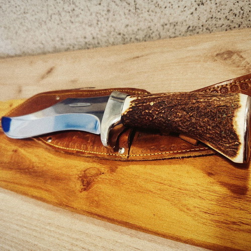 Massive hunting knife new from collection with elk horn handle and calf leather sheath