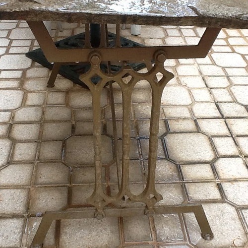 CAST IRON TABLE WITH STONE SURFACE-