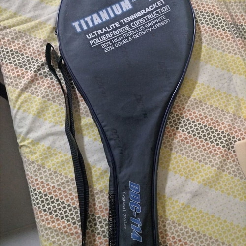 Tennis racket used with cover
