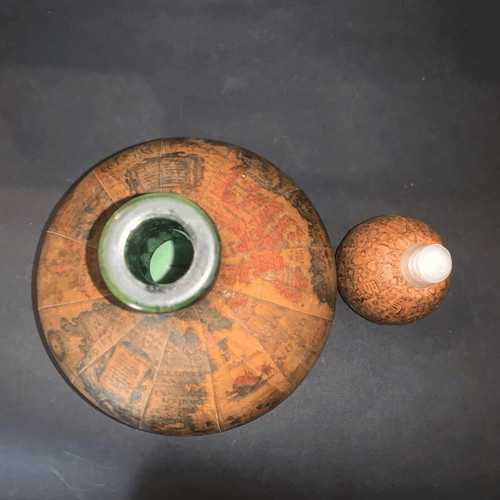 Vintage wine bottle used with Old World map design