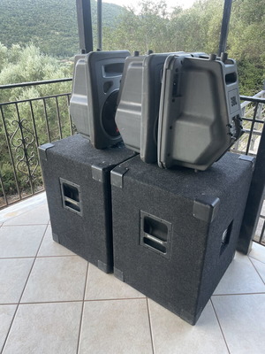 Professional speakers with 2 large subwoofers and 3 small JBL speakers