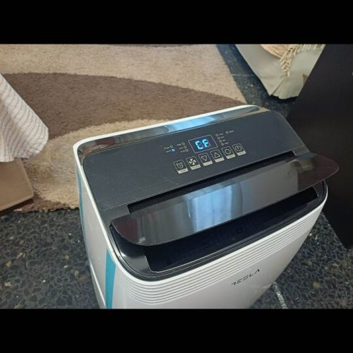 Tesla Portable Air Conditioner Cooling and Heating like new, 2024 model