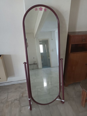 Full-length floor mirror with metal base used, burgundy
