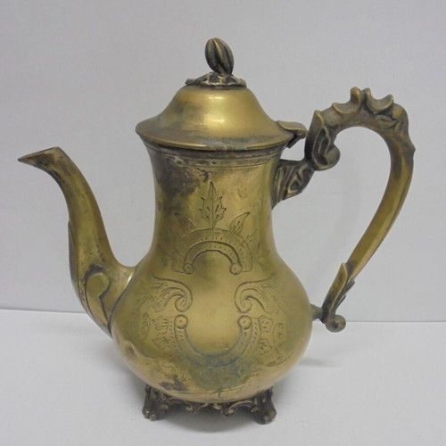 Old bronze teapot with decorative ornaments