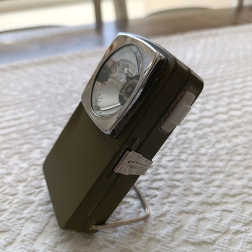 Tin flashlight from the 70s vintage used