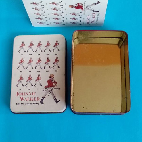 Johnny Walker collectible playing cards like new with metal case