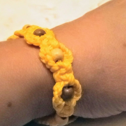 Handmade bracelet like new with yellow wooden beads
