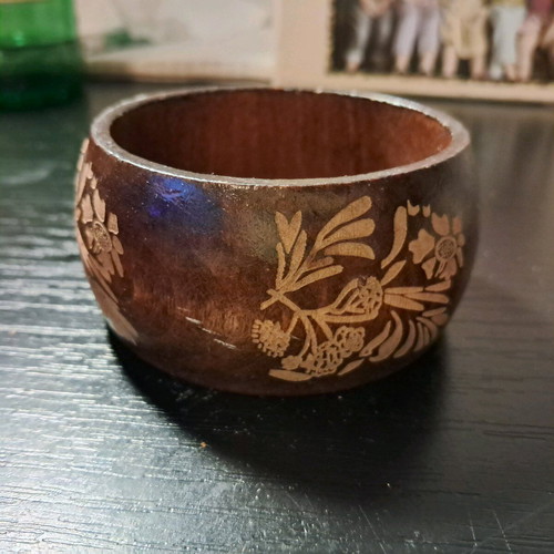 Wooden bracelet with designs like new, beige and brown