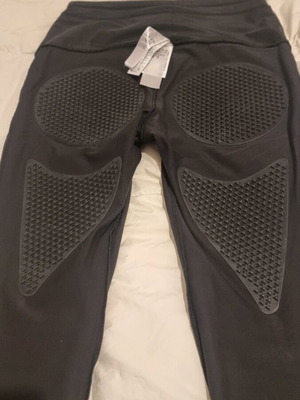 Black elastic leggings like new with internal lipolysis-massage lining for cellulite