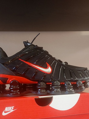 Nike Shox athletic shoes new, black and red