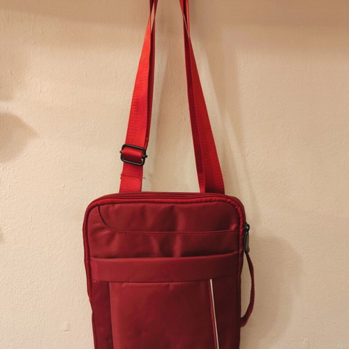 Waterproof red shoulder and hand bag for tablet