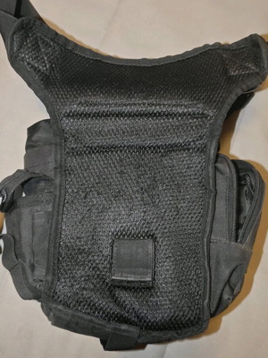 Thigh bag used with multiple compartments and phone pocket