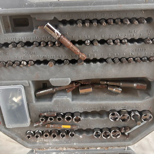 Globus impact drill used with large set of bits and sockets