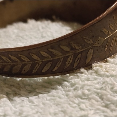 Vintage copper cuff bracelet with Greek neoclassical motifs, used