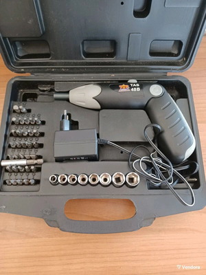 Cordless screwdriver used with case and bits