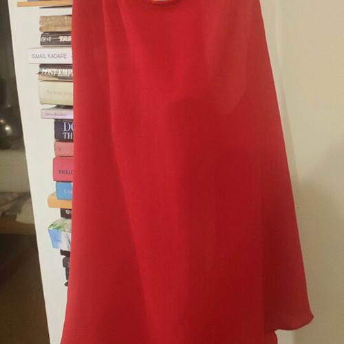 Red sleeveless flowing top used, size S, semi transparent material