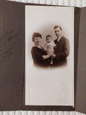 Old triptych photo of couple with child used