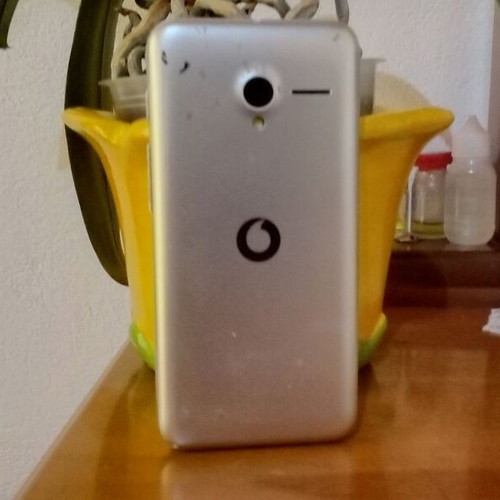Vodafone smartphone used, tin can with wire category