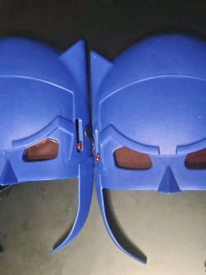 Batman mask pair used, 2011 edition, blue with red lenses
