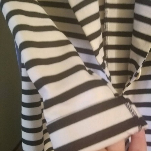 Jacket like new, white with black stripe, size medium