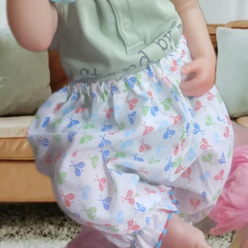 Baby set 3-6 months with balloon pants, green logo bodysuit, vintage cap