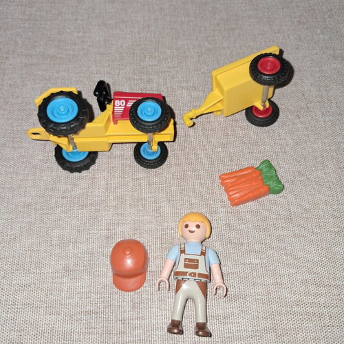 Playmobil small farmer figure with tractor like new