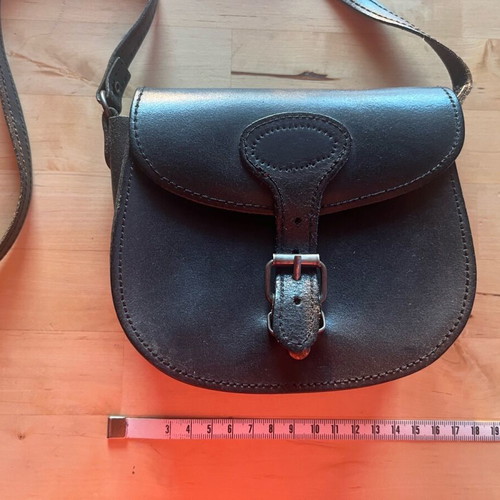 Black leather crossbody bag used
