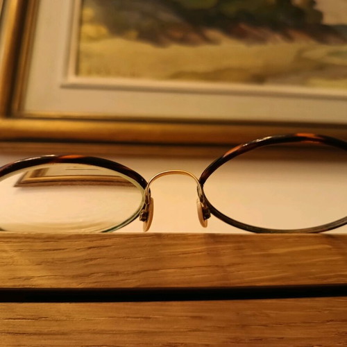 Eyeglasses used, very lightweight, gold color