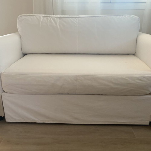 IKEA HAGALUND two-seater sofa bed, white